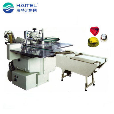 เครื่องบรรจุอลูมิเนียมฟอยล์ช็อคโกแลตแบนไม่สม่ำเสมอ 1.1kw 160 - 180 ชิ้น / นาที